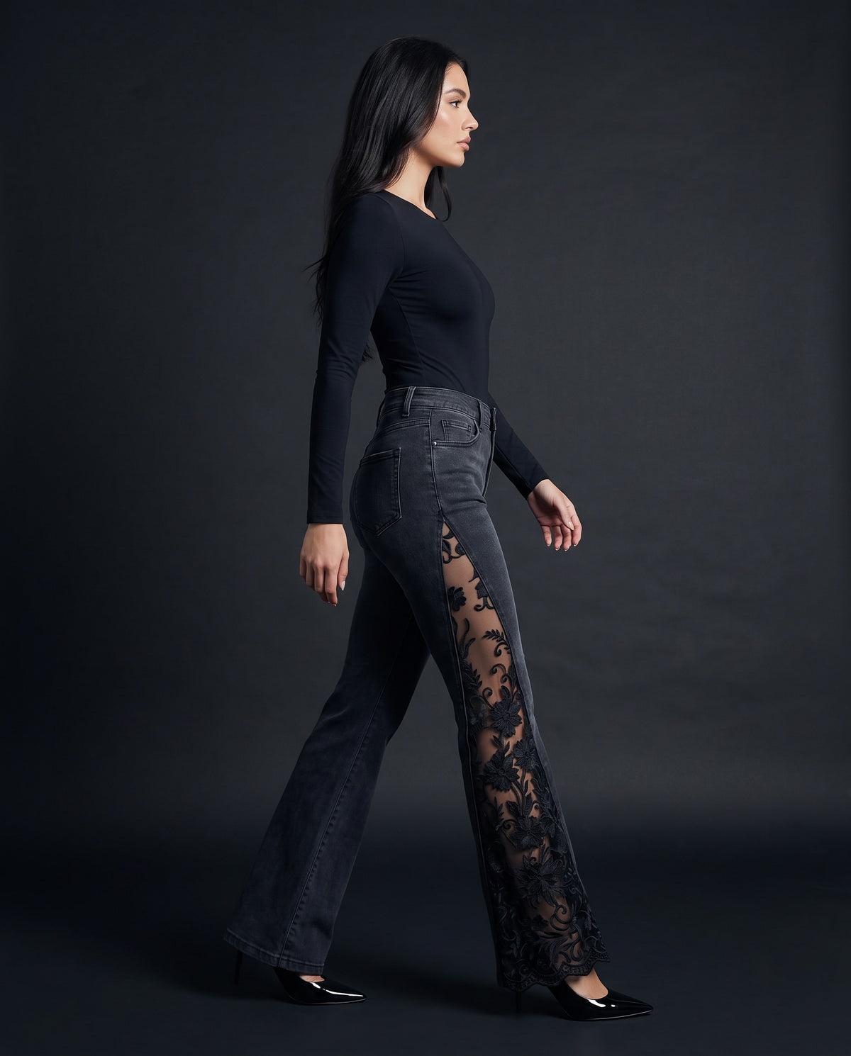 Side profile showing the embroidered lace panel from thigh to hem
